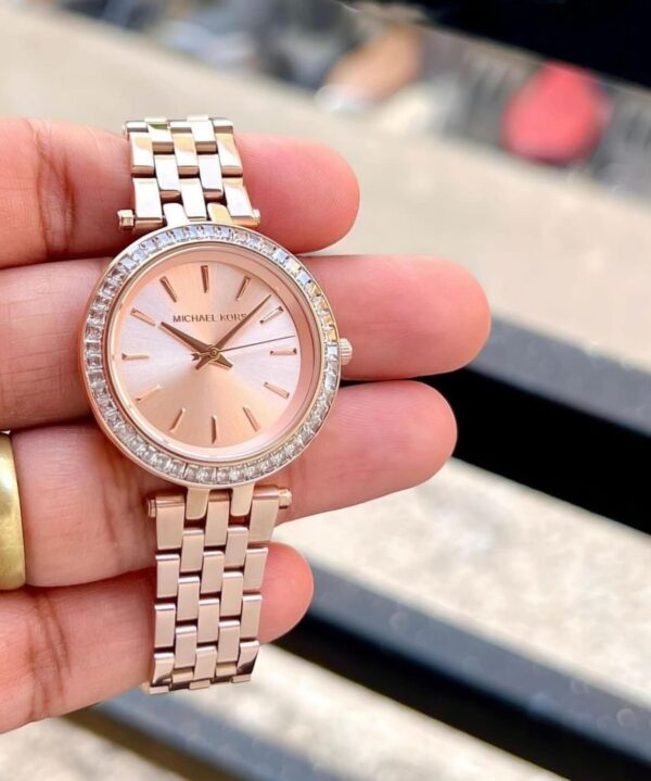 Ladies Everest watch by Michael Kors. This piece is simply stunning. It is made from  Rosegold colour steel and features a beautiful glitzy stone set bezel. - Image 4