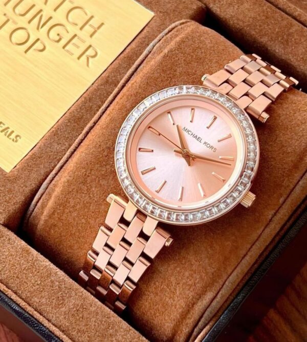 Ladies Everest watch by Michael Kors. This piece is simply stunning. It is made from  Rosegold colour steel and features a beautiful glitzy stone set bezel. - Image 2