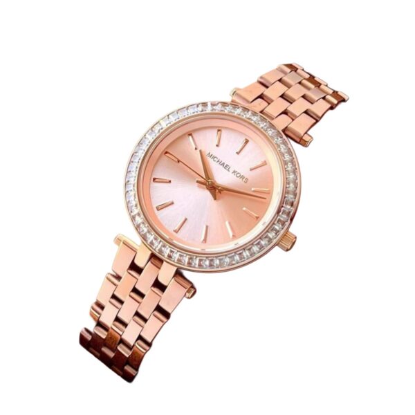 Ladies Everest watch by Michael Kors. This piece is simply stunning. It is made from  Rosegold colour steel and features a beautiful glitzy stone set bezel.